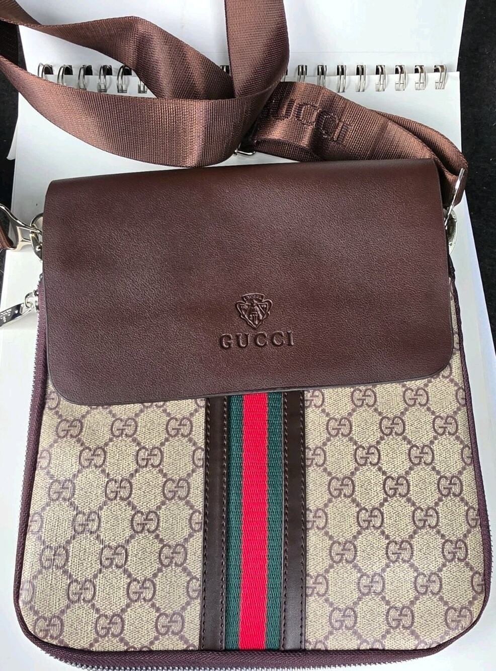 Crossbody bag with leather and strap